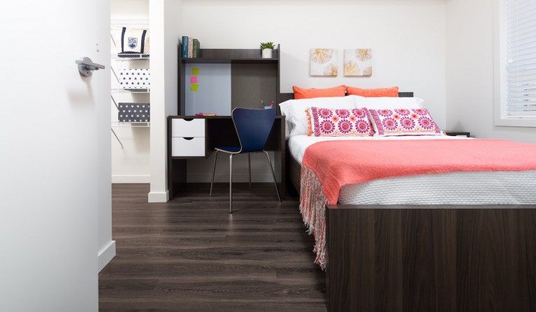 bedroom with desk area