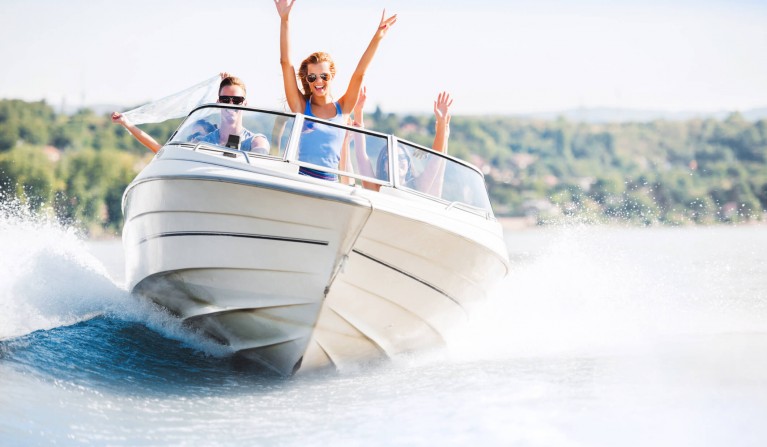 girls in a speed boat