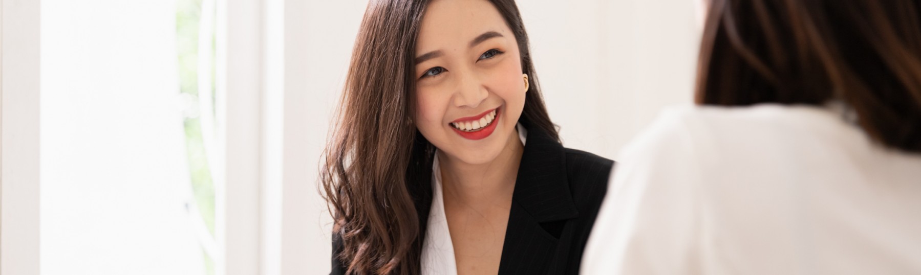 business woman talking to another person